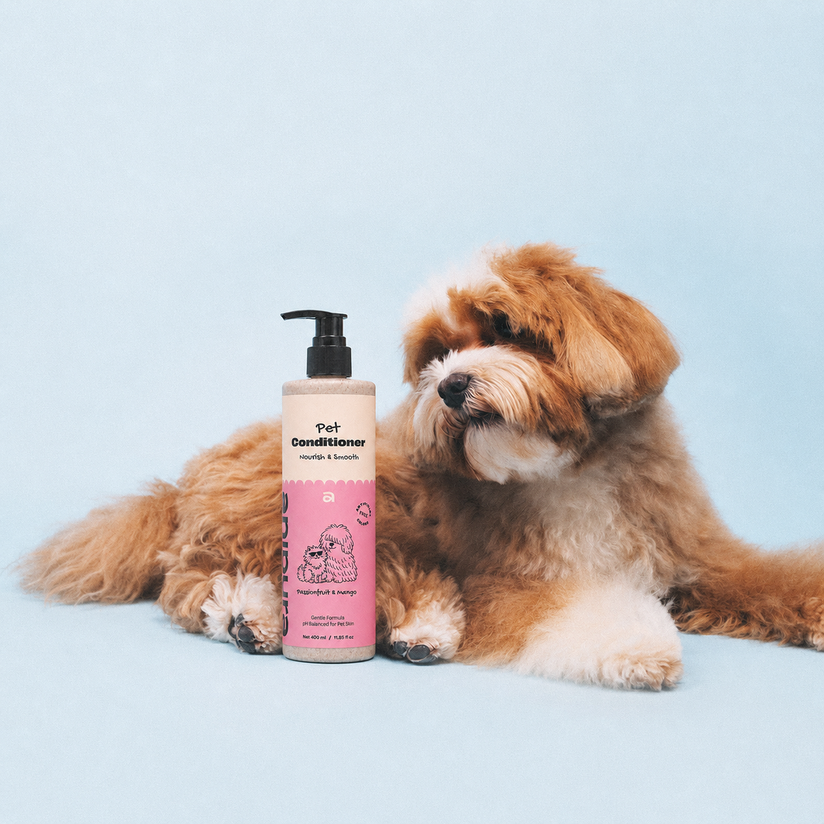 ANIPURA Pet Conditioner Passionfruit & Mango beside dogs